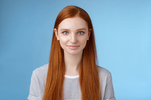 Excited good-looking confident young dreamy redhead girl blue eyes aimed success determined get job attend interview standing self-assured smiling friendly encourage herself, blue background - Φωτογραφία, εικόνα