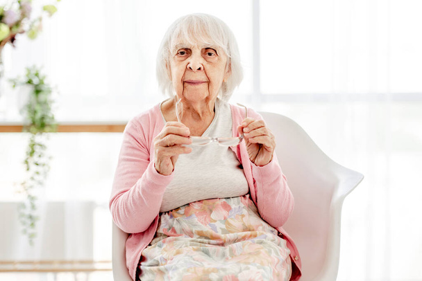 Senior woman with eyeglasses - Фото, изображение