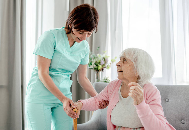 Elderly woman and nurse - Photo, image