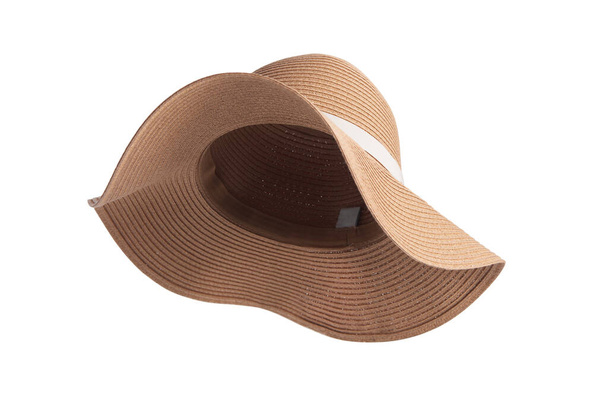 ヴィンテージパナマ帽子、女性の夏の黄色の麦藁帽子白い背景に白いリボン. - 写真・画像