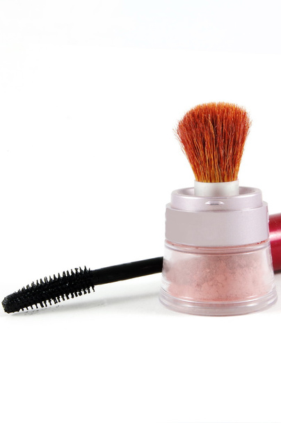 Make up and mascara brush over the white surface - Photo, Image