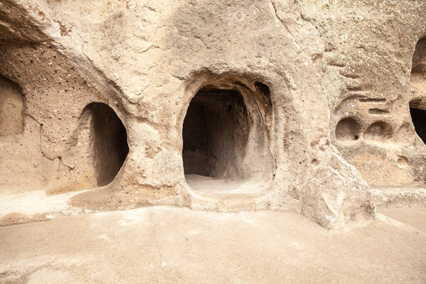Travel to Georgia - room in an artificial ancient cave city in Vardzia. Most popular Georgian attraction - 写真・画像