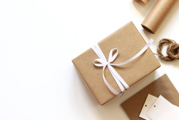Minimal Christmas Flatlay in Beige and White. Gift Box Packaging Decoration.  - Фото, изображение