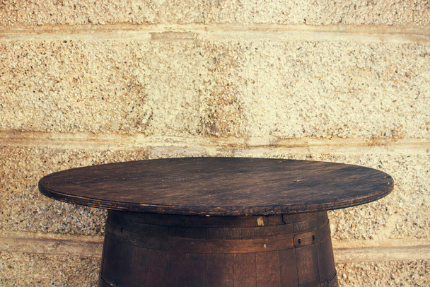 old barrel table with copy space, this version has a vintage effect - Foto, Imagen
