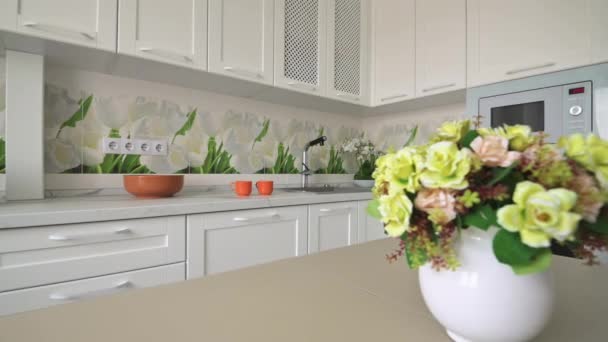 White moden classic kitchen with dining table - Footage, Video