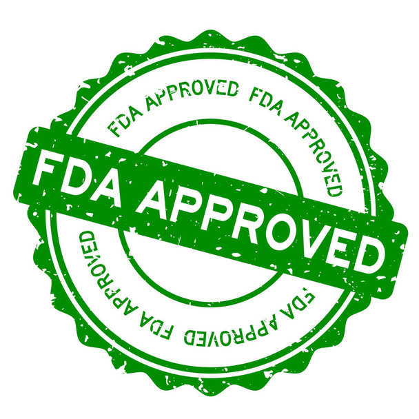 Grunge zöld FDA (rövidítése Food and Drug Administration) jóváhagyott szó kerek gumi pecsét fehér alapon - Vektor, kép