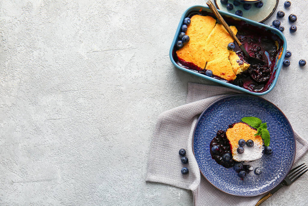 Composition with blueberry cobbler on light background - Foto, afbeelding