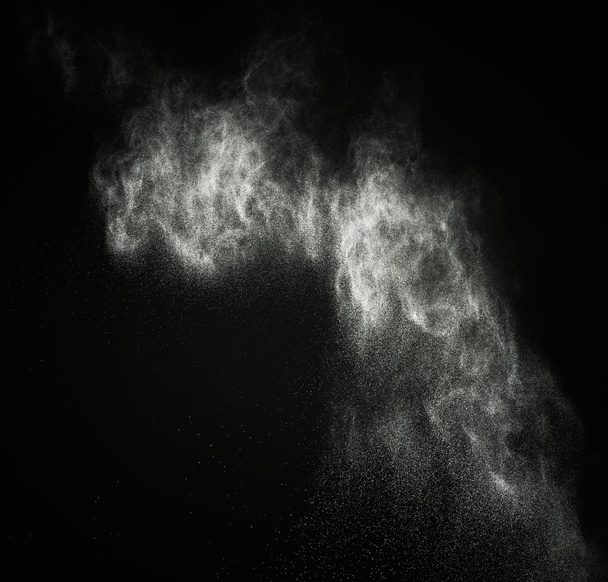 Polvo blanco explotando aislado en negro
 - Foto, Imagen