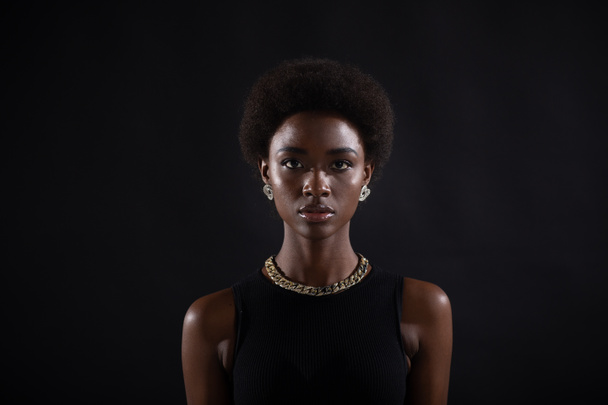 Portrait of young serious stylish black woman - Photo, Image