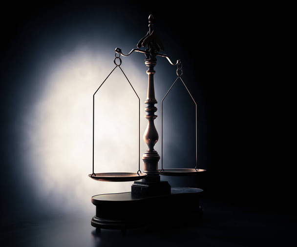 Ornate brass justice scales with a wooden base backlit on a dark moody background - 3D render - 写真・画像
