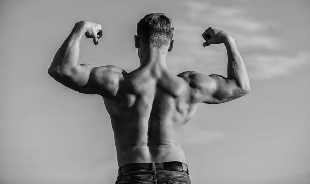 Bodybuilder shape. Sexy body. Triumph and loss. Bigger muscles grow. Increase overall muscle mass. Man muscular chest naked torso sky background. Man muscular athlete bodybuilder show muscles - Φωτογραφία, εικόνα