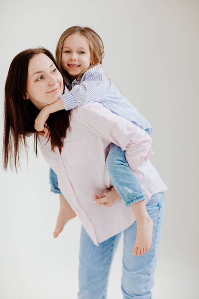  Mom and daughter play and have fun. beautiful happy family - Fotó, kép