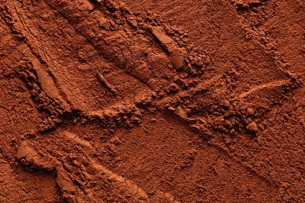 Natural cocoa powder textured background, copy space - Фото, изображение