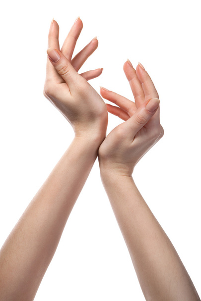 figure from female hands isolated on white - Φωτογραφία, εικόνα