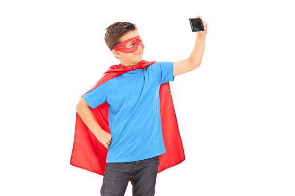 Boy in costume taking selfie - Fotó, kép