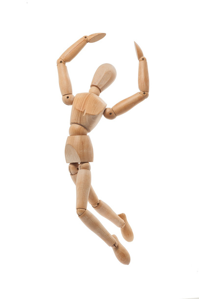 Wooden mannequin jumping - 写真・画像