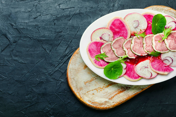 Appetizing dietary salad with veal tongue and radish - Fotoğraf, Görsel