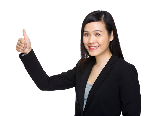 Business woman with thumb up - 写真・画像