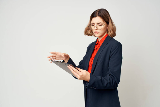 Business woman with  documents at  work. High quality photo - Foto, Imagen