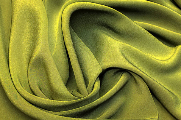 Tela de seda crepe de chine en color caqui en diseño artístico. Textura, fondo. plantilla. - Foto, imagen