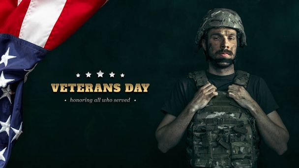 Honor. Design for greeting card, poster for Veterans day, Memorial day. Close-up American male soldier next to USA flag isolated over grey background - Foto, immagini