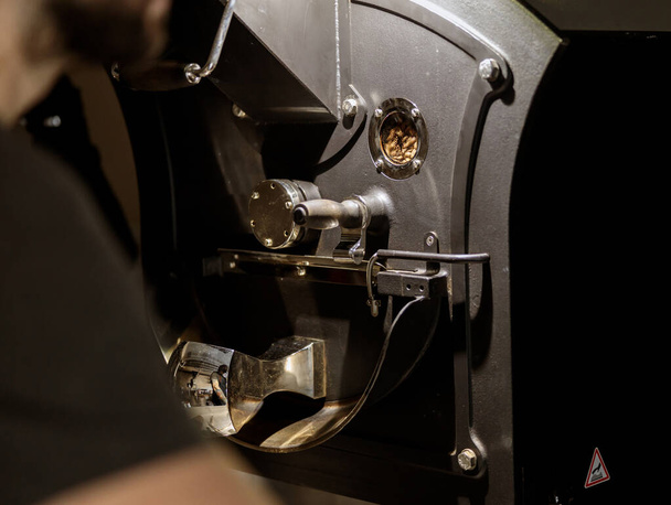 Modern coffee roasting machine with various metal parts - Fotoğraf, Görsel