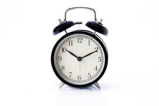 Fekete retro Alarm óra elszigetelt fehér háttér - Fotó, kép