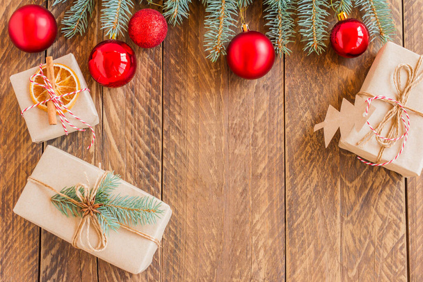 Flat lay composition with Christmas decor on wooden background. Space for text. - Foto, immagini