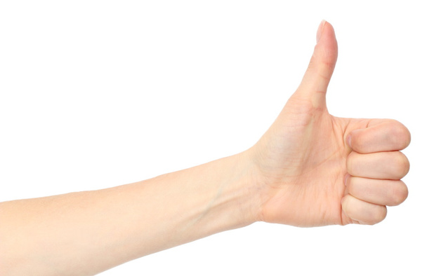 Hand of woman showing thumbs up on white background - Foto, Bild