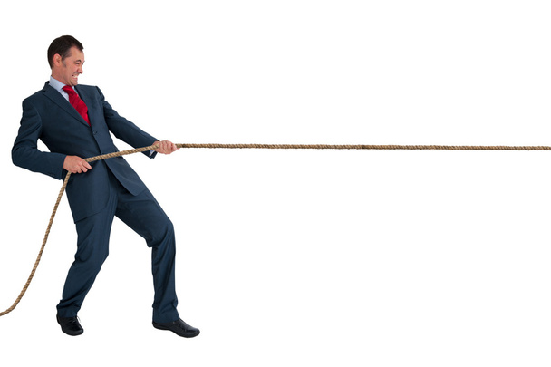 Homme d'affaires tirant une corde - Photo, image