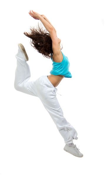 modern slim hip-hop style dancer teenage girl jumping dancing  - Фото, зображення