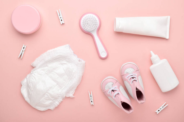 Accessories for the baby on a pink background. Child care. Flat lay, top view, copy space. - Photo, image