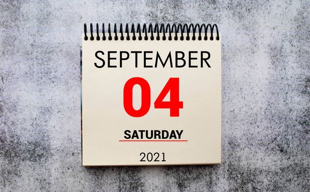 Save the Date written on a calendar - September 04. - Photo, Image