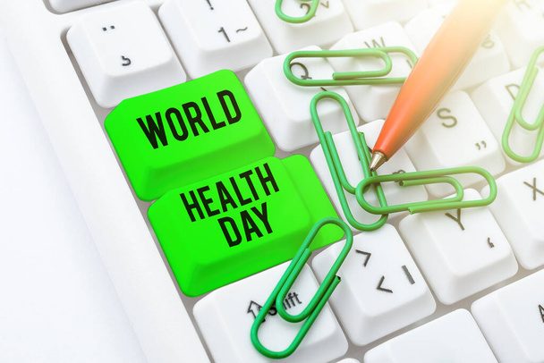Az Egészségügyi Világnap felirata. Üzleti ötlet minden évben április 7-én ünneplik a globális egészségtudatosság napját Nehéz programkódok gépelése, Új oktatási könyv írása - Fotó, kép