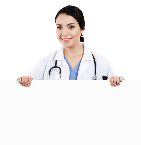 Жінка-лікар тримає порожній знак
 - Фото, зображення