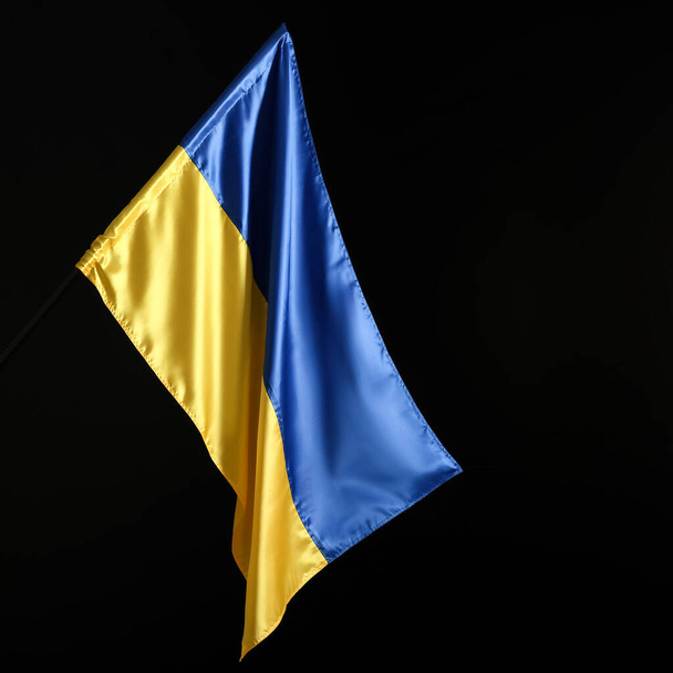 Flag of Ukraine on dark background - Fotó, kép