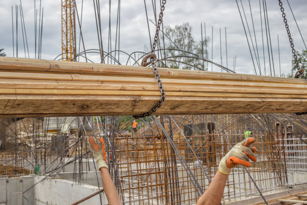 Lifting timber plank for formwork - Photo, Image