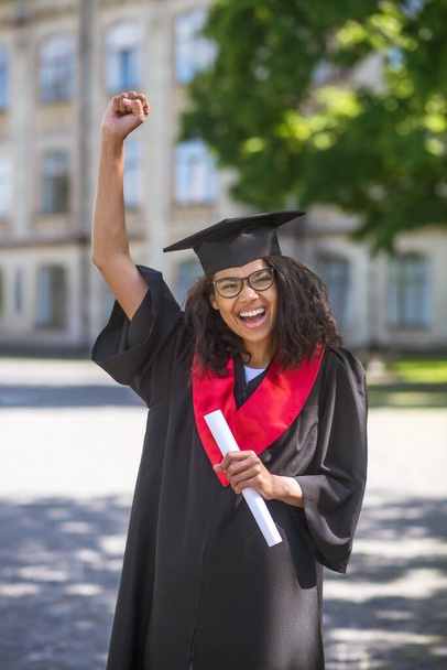 A female student feeling awesome about college graduation - Foto, immagini