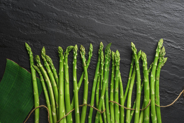 Asparagus from the garden on black background - Photo, Image