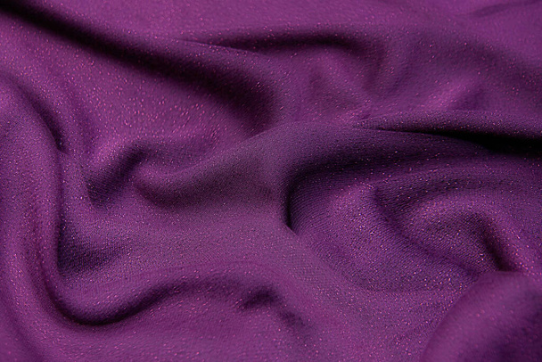 The texture of silk fabric in fuchsia. Background, pattern. - Photo, Image