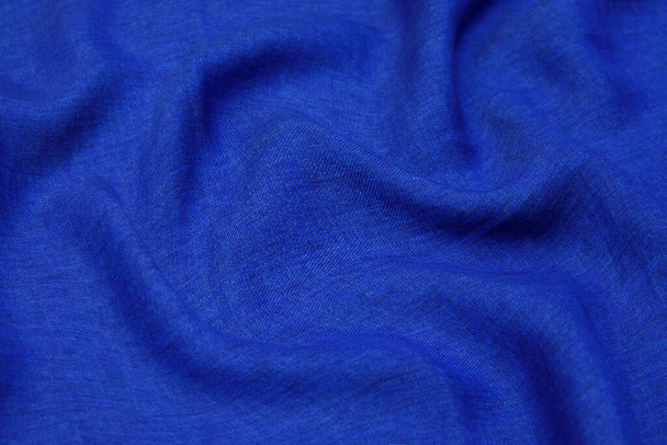 Blue fabric texture background, wavy fabric soft blue color, luxury satin or silk cloth texture. - Photo, Image