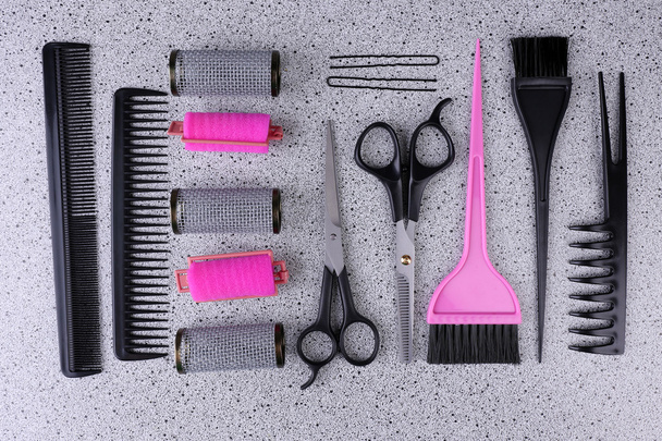 Professional hairdresser tools  on gray background - Фото, зображення