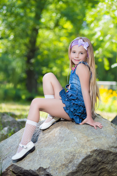 Little girl in jeans dress - Photo, Image