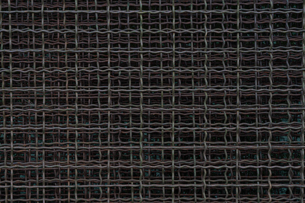 фон в виде металлической сетки-цепи - Фото, изображение
