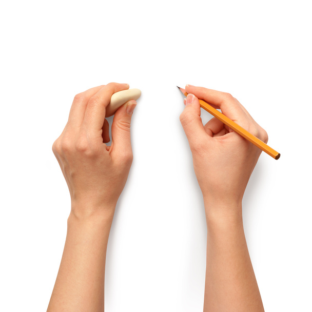 mains humaines avec crayon et gomme caoutchouc
 - Photo, image