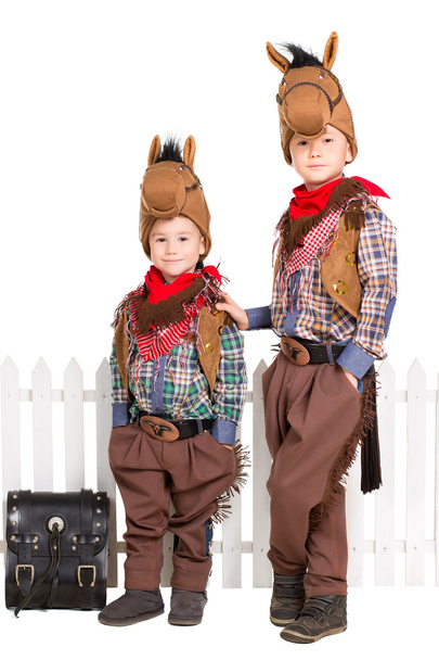 Two boys in horse costumes - Фото, изображение