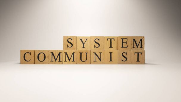 Nazwa System Komunistyczny powstał z drewnianych kostek z literami. Ekonomia i finanse. zbliżenie. - Zdjęcie, obraz