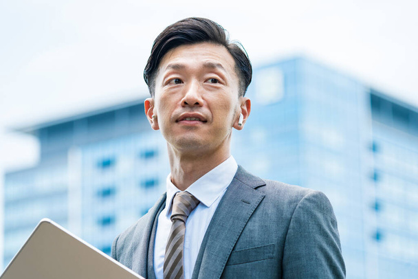 Asian businessman with a serious look - Fotó, kép