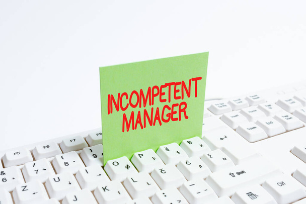 Text sign showing Incompetent Manager. Word Written on Lacking qualities necessary for effective boss conduct Computer Laptop For Communication Typing New Ideas And Plan Development - Photo, Image