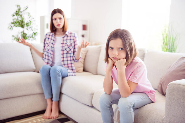 Photo of unhappy furious mad upset little girl sisters bad mood conflict indoors inside house home apartment - Φωτογραφία, εικόνα